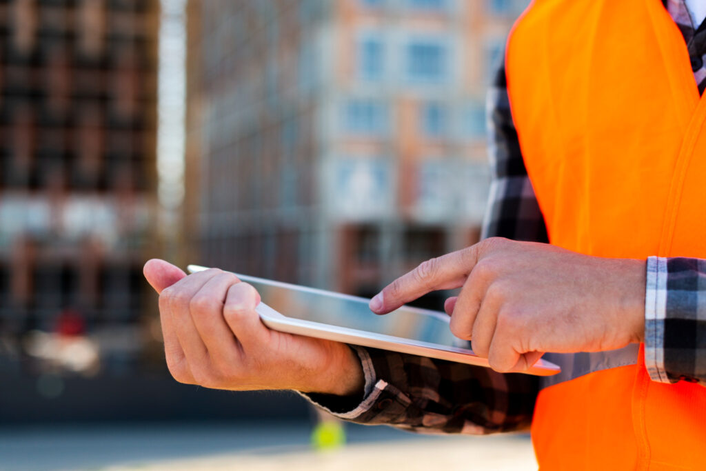 close-up-construction-engineer-using-tablet